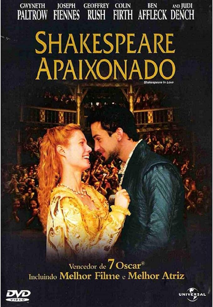 Para todos verem: Banner do filme em que há uma mulher de vestido amarelo, sorrindo, abraçada e olhando para um homem de terno azul. jaqueta verde. Ao fundo há uma platéia. Lê-se: "Gwyneth Paltrow. Joseph Fiennes. Geoffrey Rush. Colin Firth. Ben Affleck. And Judi Dench. Shakespeare Apaixonado. Shakespeare in Love. Vencedor de 7 Oscar. Incluindo Melhor Filme e Melhor Atriz. DVD Vídeo. Universal".