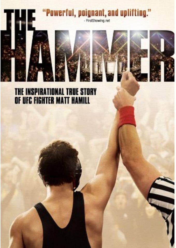 Para todos verem: Texto: "Powerful, poignant, and uplifting - FirstShowing.net. The Hammer. The inspirational true story of UFC fighter Matt Hamill". Ilustração: Banner com um árbitro de luta levantando a mão de um lutador. Ao fundo há uma plateia.