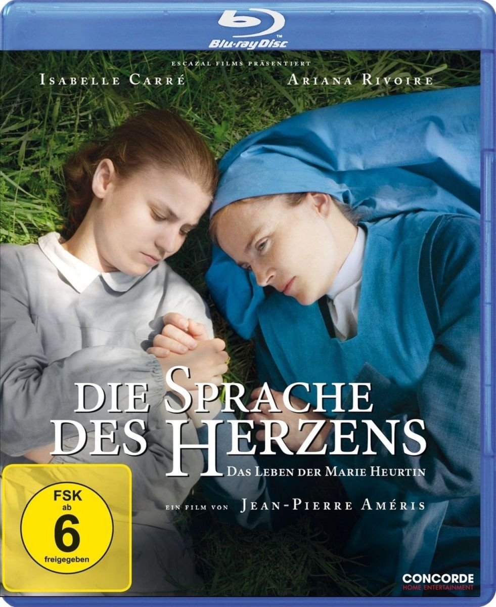 Para todos verem: Texto: "Blu-ray Disc. Escazal films präsentiert. Isabelle Carré. Ariana Rivoire. Die Sprache des Herzens - Das Leben der Marie Heurtin. Ein film von  Bester Fremdsprachiger Film 1997. Digitally remastered. Ein film von Jean-Pierre Améris. Concorde Home Entertainment". Ilustração: Banner em que há uma moça e uma freira deitadas na grama. A freira está segurando a mão da moça.