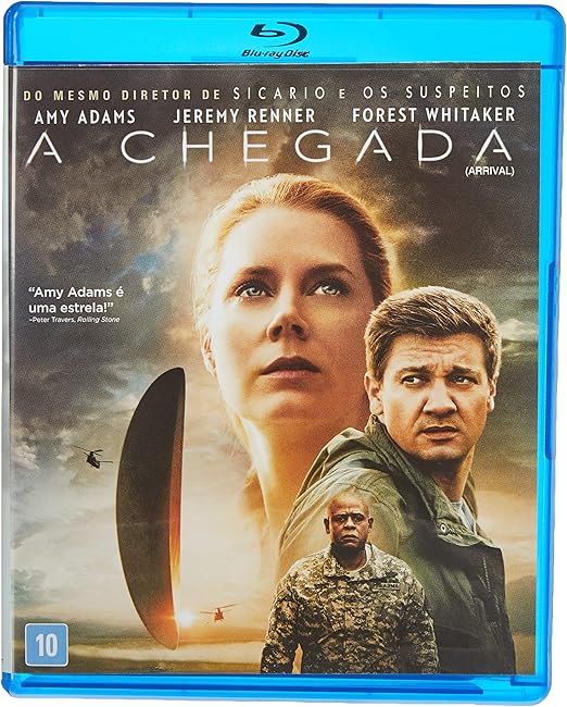 Para todos verem: Texto: Blu-ray Disc. Do mesmo diretor de Sicario e Os Suspeitos. Amy Adanms; Jeremy Renner; Forest Whitaker. A Chegada (Arrival). Amy Adams é uma estrela! - Peter Travers, Rolling Stone. Ilustração: Banner em que há uma mulher e dois homens. Ao fundo há grama, céu, helicópteros e uma nave alienígena. 
