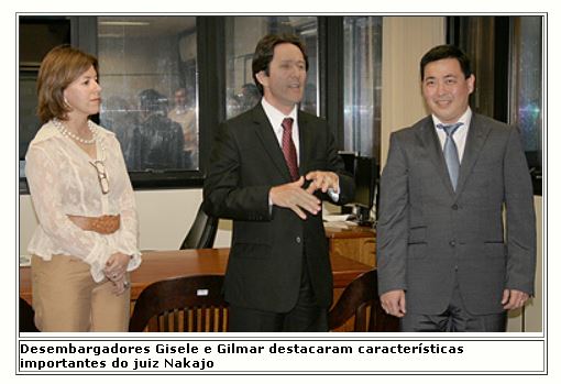 Desembargadores Gisele e Gilmar com o juiz Nakajo em posse