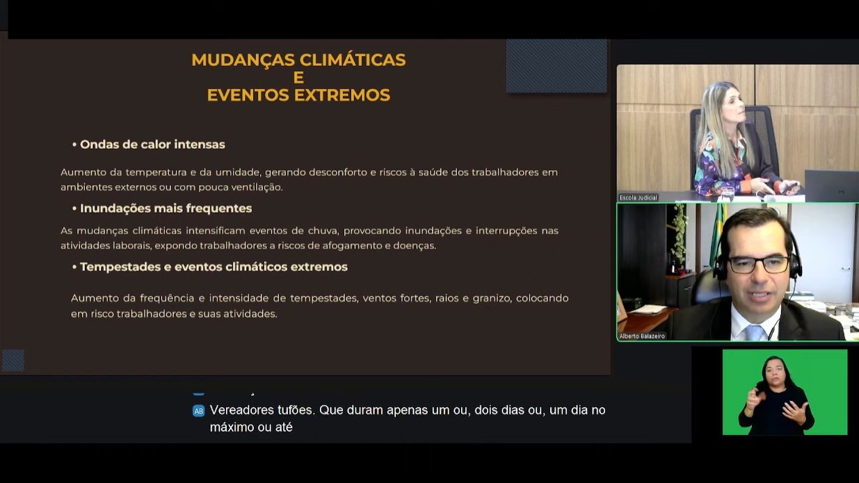 print de tela que mostra parte de uma apresentação, uma desembargadora e um ministro, além da intérprete de Libras