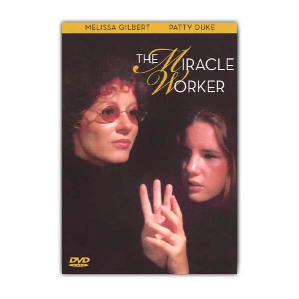 Para todos verem: Texto: "Melissa Gilbert. Patty Duke. The Miracle Worker. DVD Video. Ilustração: Banner em tons de preto que há duas mulheres interagindo com as mãos. A mulher da esquerda usa óculos.