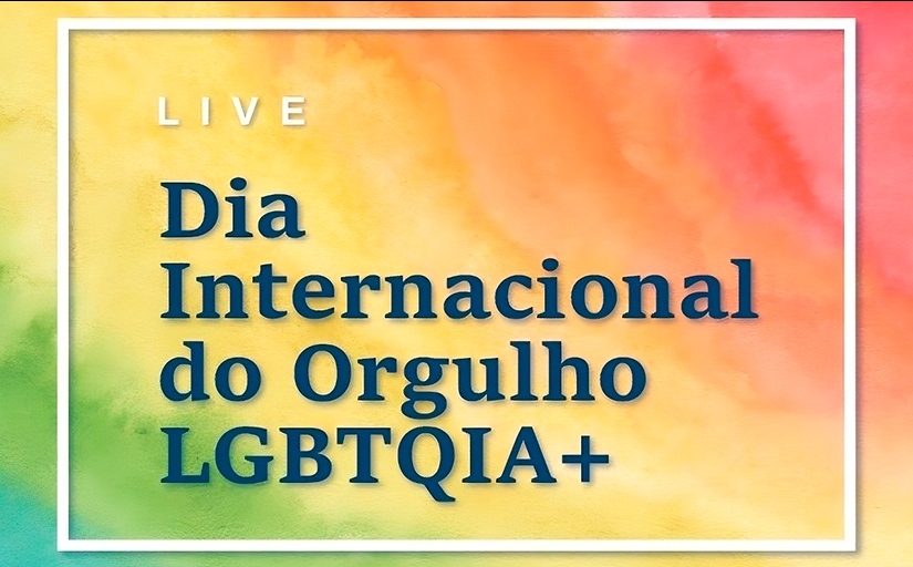 Imagem com fundo colorido, com os dizeres " Dia Internacional do Orgulho LGBTQIA+