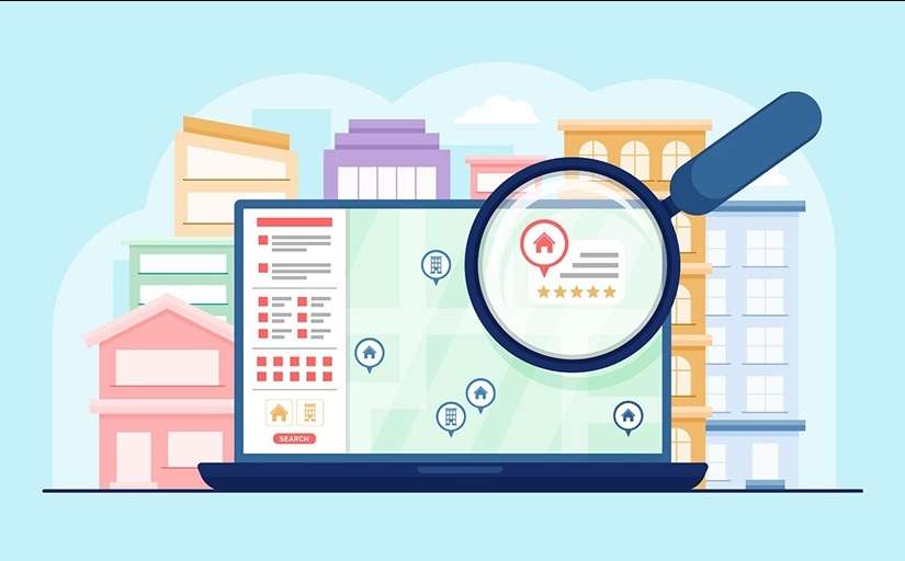 Imagem ilustrativa de um computador e uma lupa na frente da tela