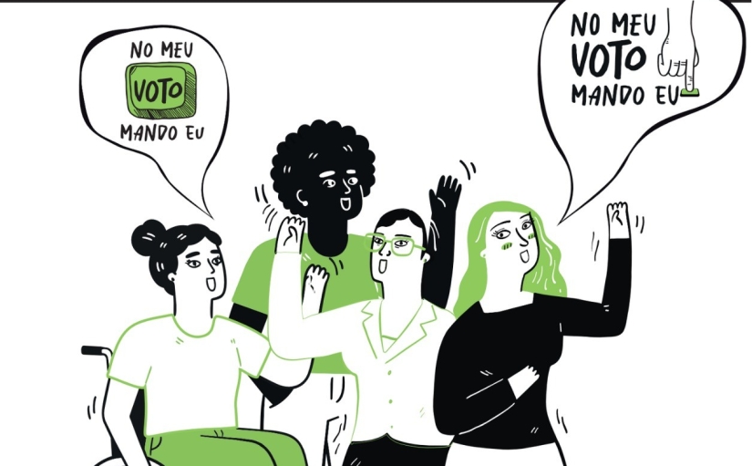 Ilustração mostra quatro pessoas, incluindo uma pessoa em cadeira de rodas, com os braços levantados. Acima delas, dois balões trazem a frase “No meu voto, mando eu”, acompanhada do desenho de uma urna eleitoral.