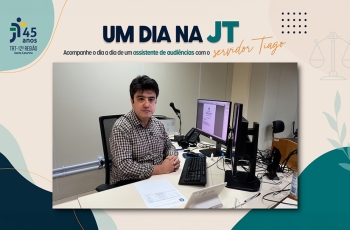 Homem vestindo camisa xadrez sentado em frente a um computador e teclado